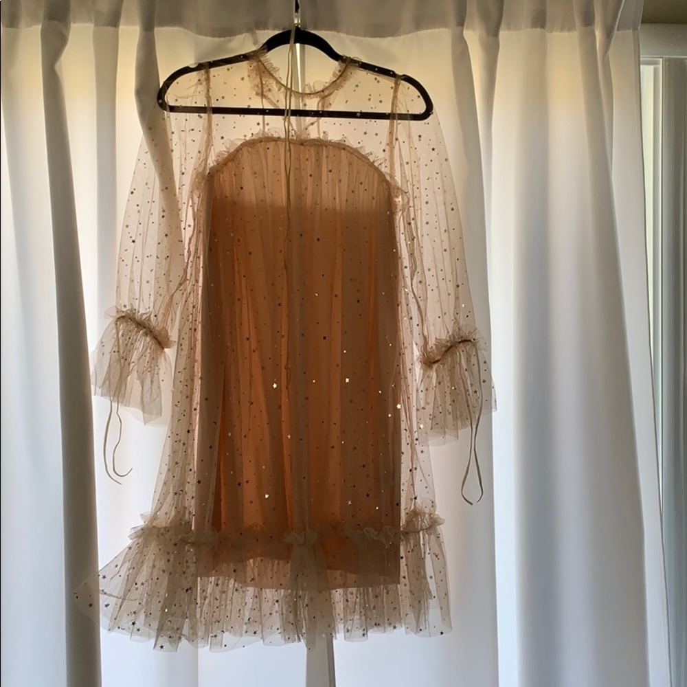 Dress with sheer overlay